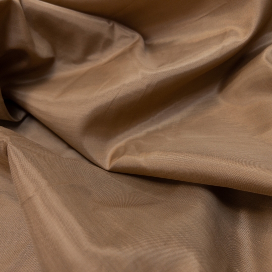 Подкладочная ткань бежево-коричневого цвета для костюмно-плательной группы 436218 Италия 480 рублей за метр