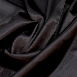 Подкладочная ткань из итальянских стоков. Плотная с матовым переливом, хорошо держит форму. Идеальна в качестве подкладки к пальто или шубе. Цвет черный, припыленный.