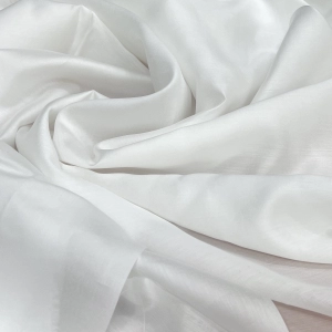 Вуаль из тенселя белого цвета. Тончайшее, воздушное полотно, с красивым перламутровым переливом. Для изящных летних изделий, туники, рубашки, сарафаны, ярусные юбки.