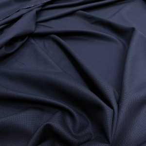 Великолепная костюмная шерсть с добавлением шёлка из стоков ARMANI. Цвет дымчатый, припылённый сине-серый в мелкую жаккардовую выработку. Полотно мягкое, очень пластичное, сминаемость почти отсутствует. Немного тянется за счет крученной нити. Плотность 275 г/м.
Прекрасно подходит для пошива ряда изделий женского гардероба: юбки, юбки, платья и костюмы. 
Отрез 2,95 м.